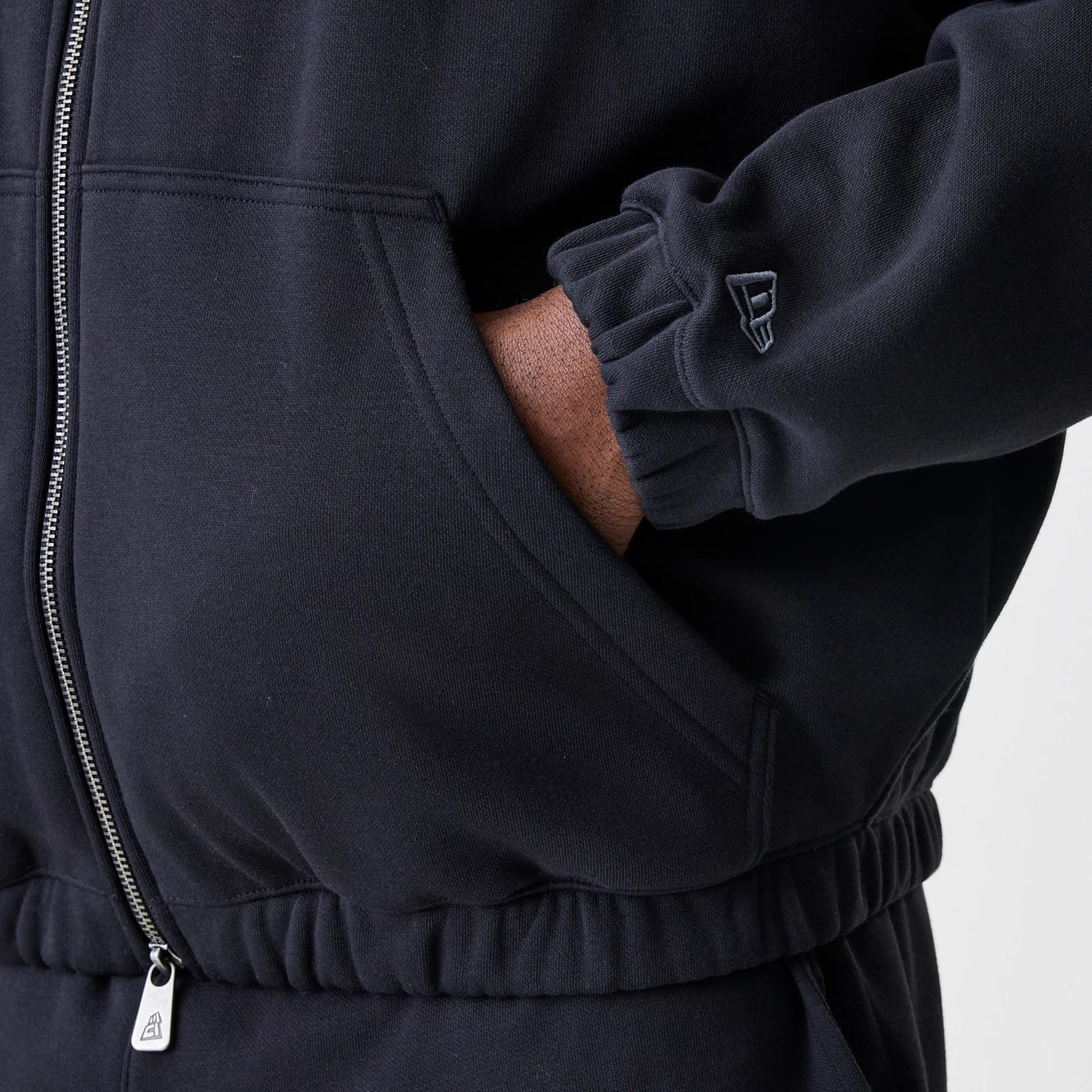 The Male model is wearing Chicago Bulls NBA Linear Black Oversized Full Zip Hoodie 5