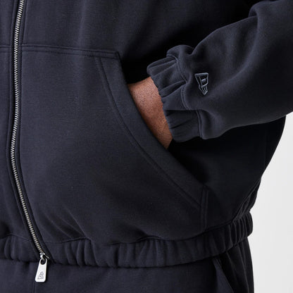 The Male model is wearing Chicago Bulls NBA Linear Black Oversized Full Zip Hoodie 5