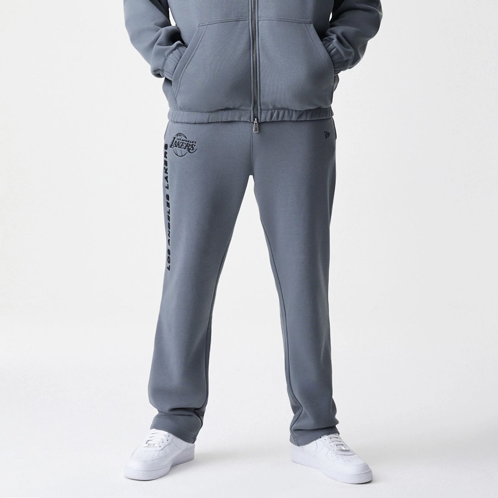 The Male model is wearing LA Lakers NBA Linear Dark Grey Straight Leg Joggers  5