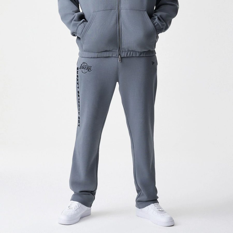 The Male model is wearing LA Lakers NBA Linear Dark Grey Straight Leg Joggers  5