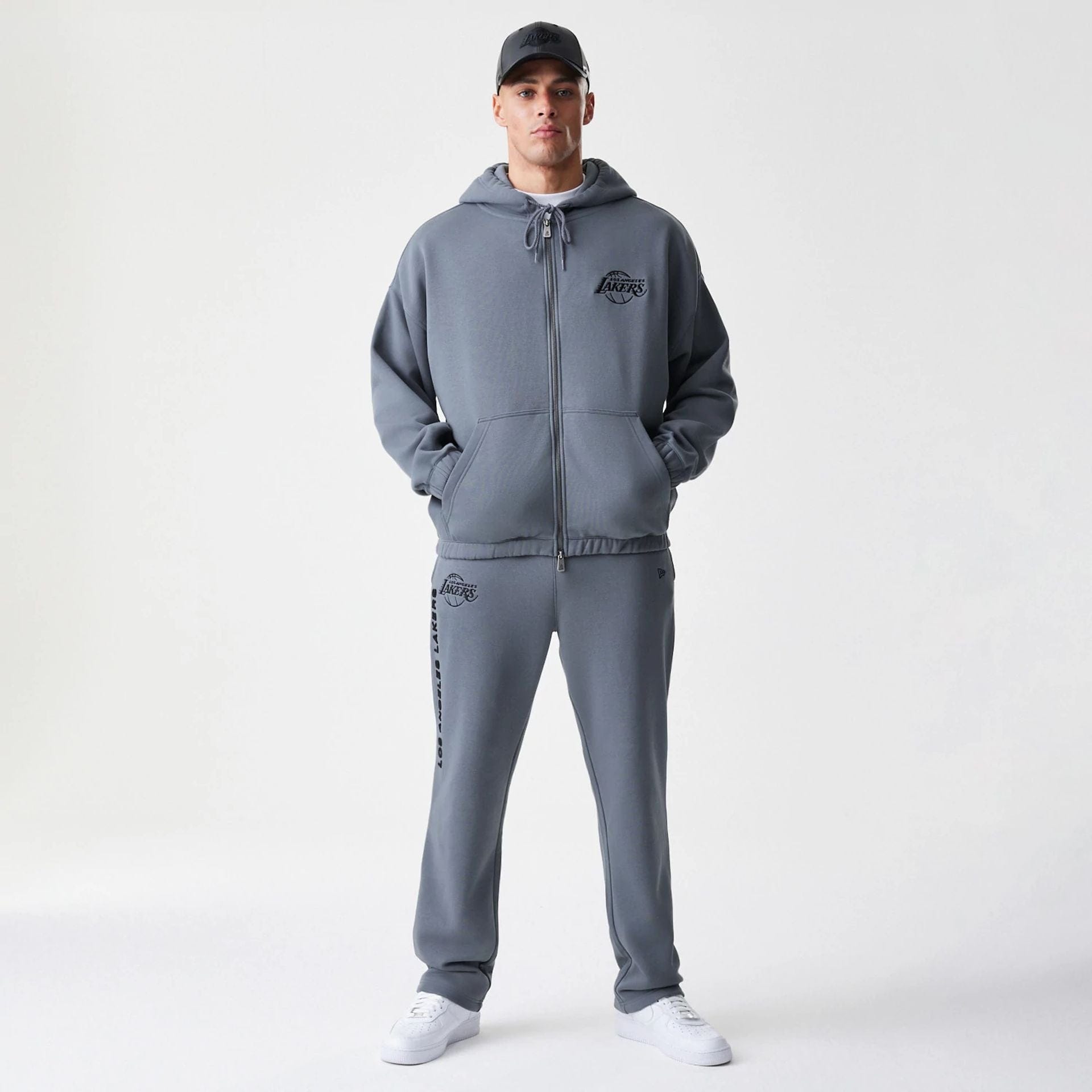 The Male model is wearing LA Lakers NBA Linear Dark Grey Straight Leg Joggers  8