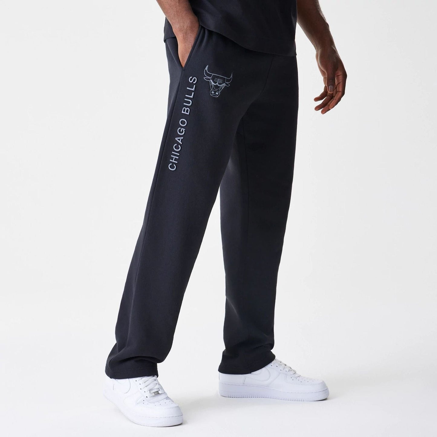 The Male model is wearing Chicago Bulls NBA Linear Black Straight Leg Joggers  1