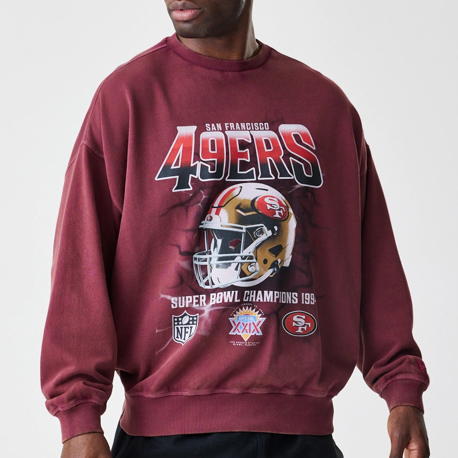 The Male model is wearing San Francisco 49ers NFL Washed Boxy Dark Red Oversized Crew Neck Sweater 3