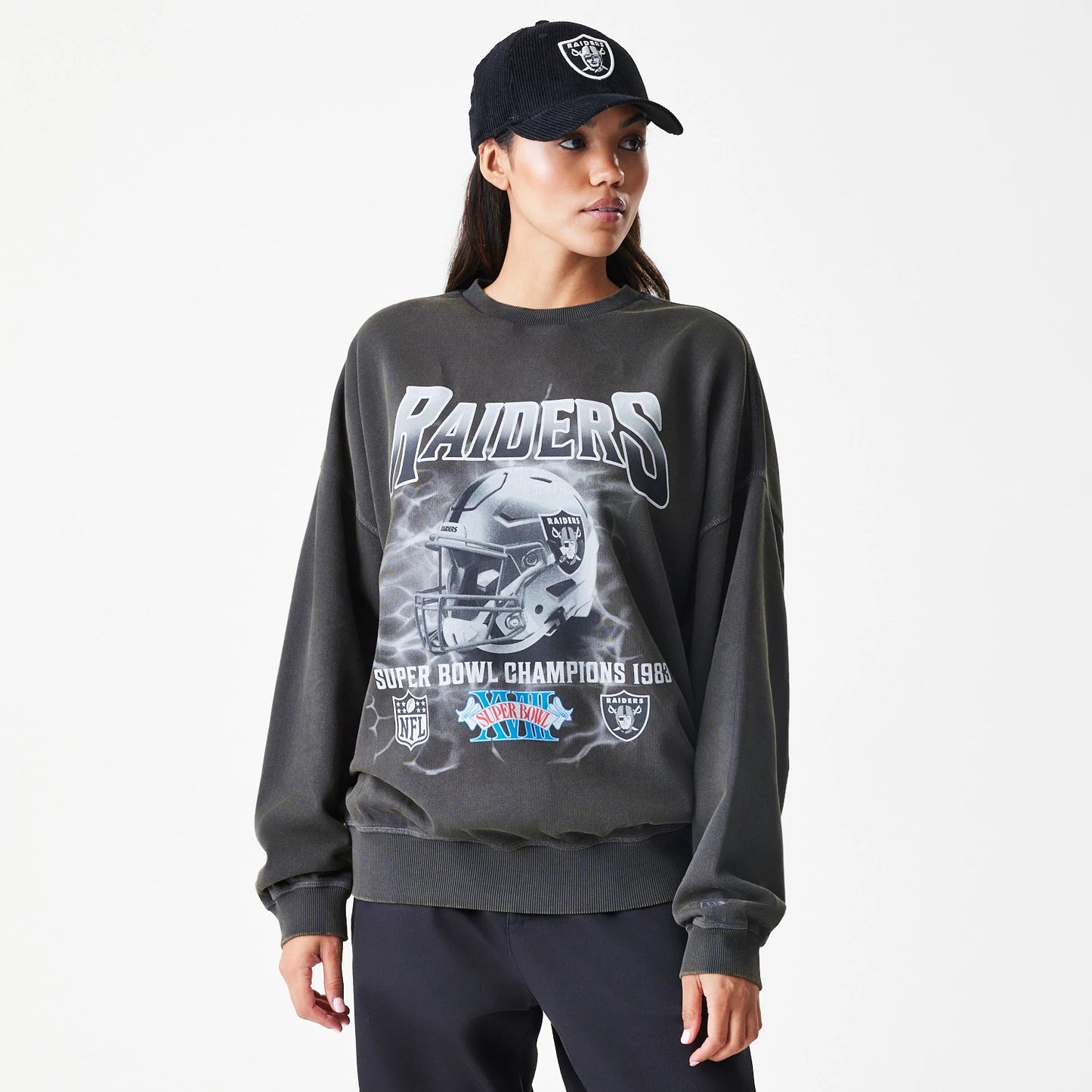 The Male model is wearing Las Vegas Raiders NFL Washed Boxy Dark Grey Oversized Crew Neck Sweater 4