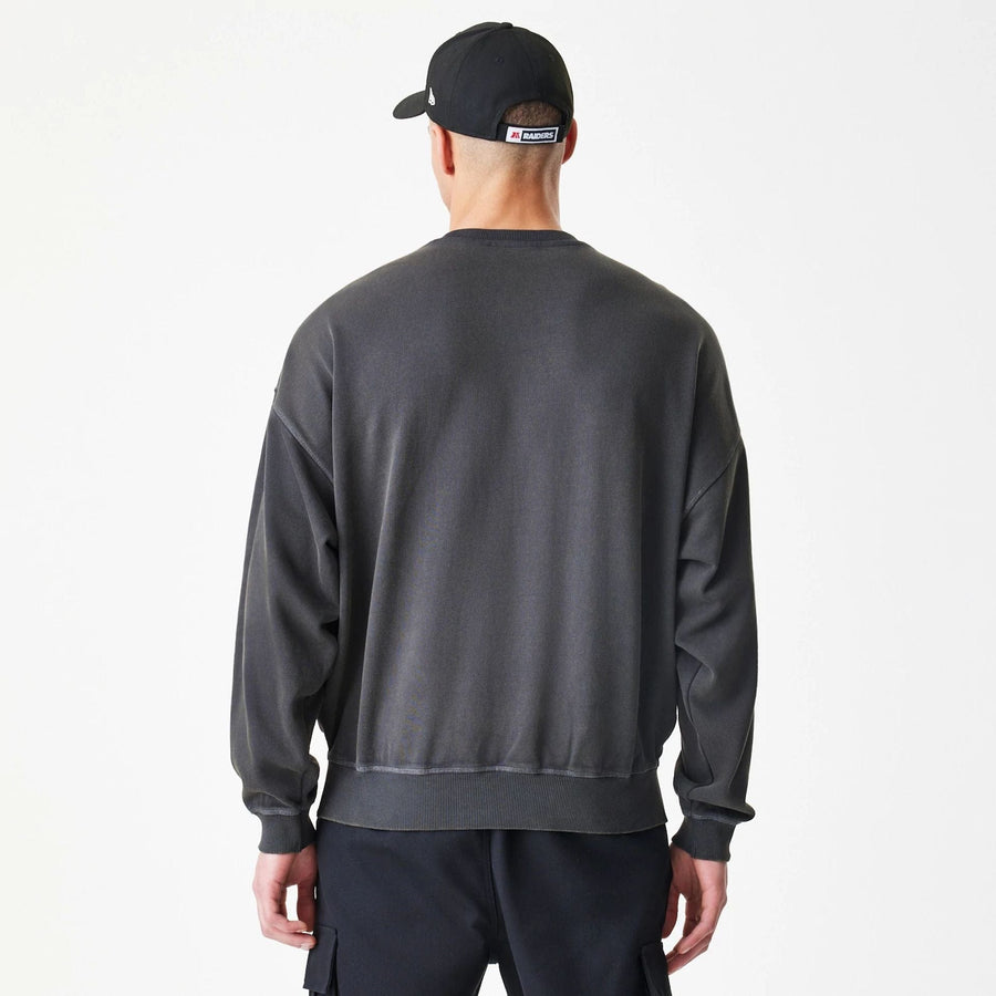 The Male model is wearing Las Vegas Raiders NFL Washed Boxy Dark Grey Oversized Crew Neck Sweater  2