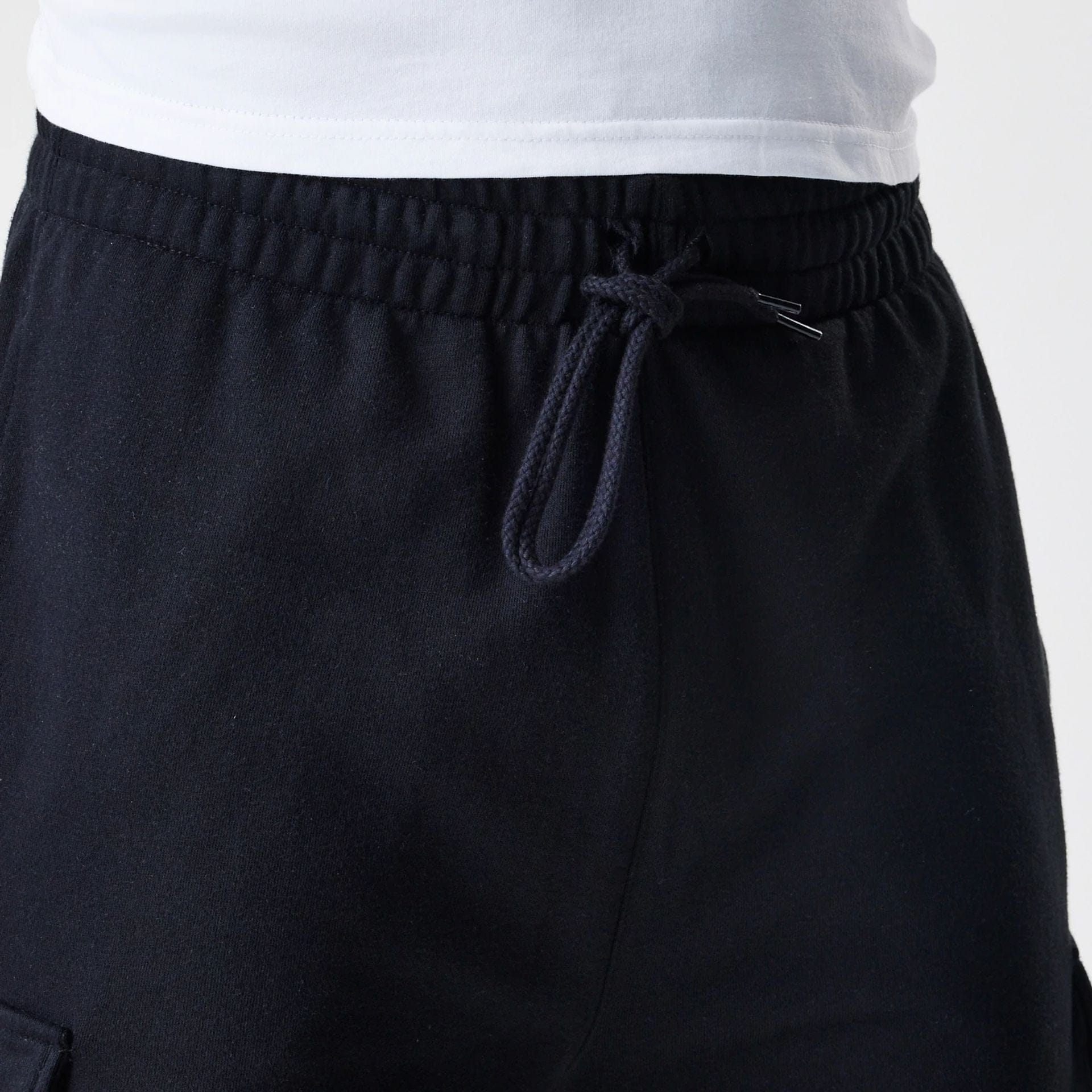 The Male model is wearing  New Era Cargo Black Joggers  6