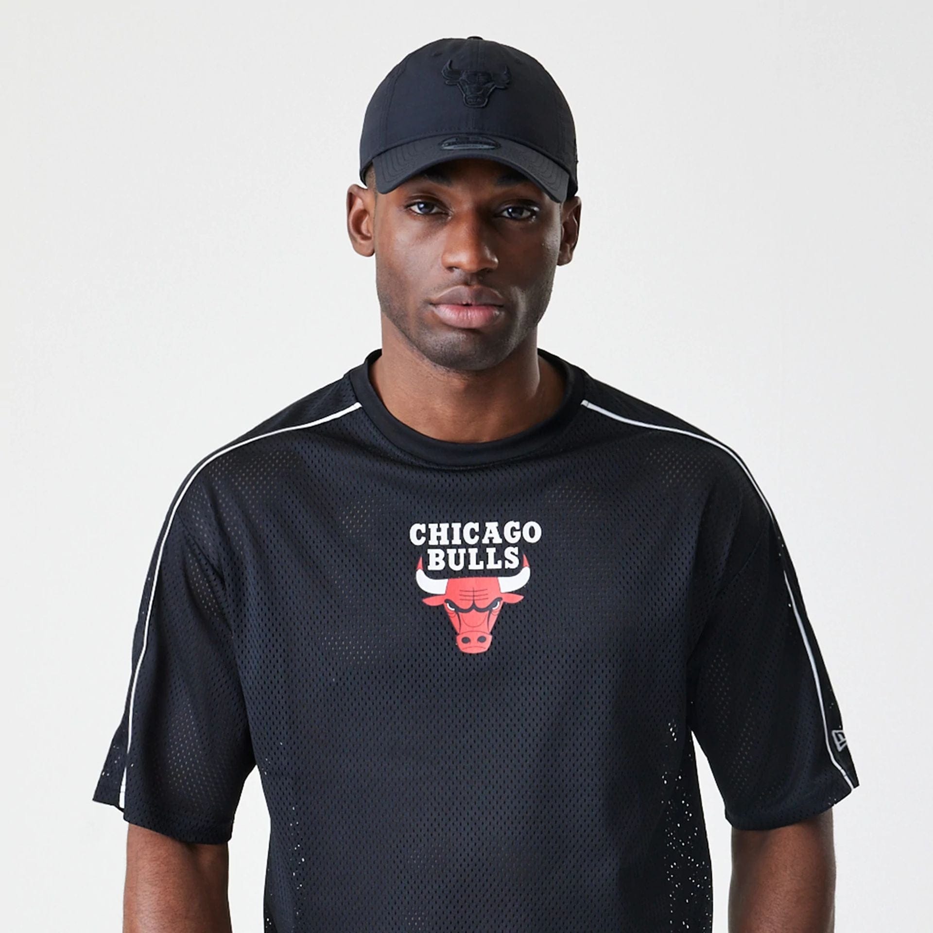 The Male model is wearing Chicago Bulls NBA Piping Black Oversized T-Shirt  6