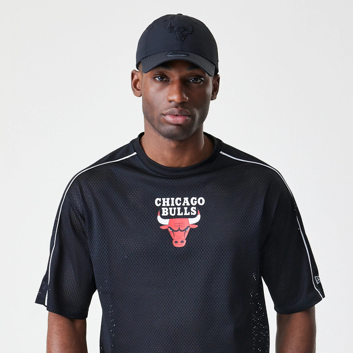 The Male model is wearing Chicago Bulls NBA Piping Black Oversized T-Shirt 6