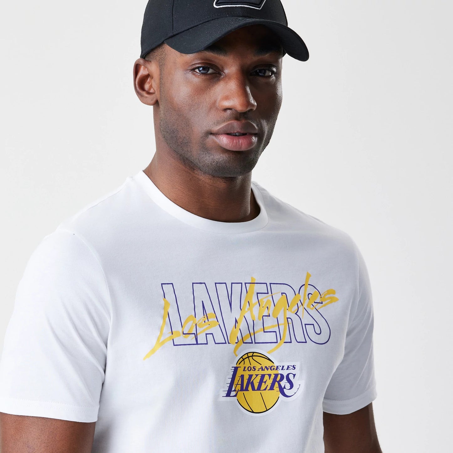 The Male model is wearing LA Lakers NBA Script White T-Shirt 4