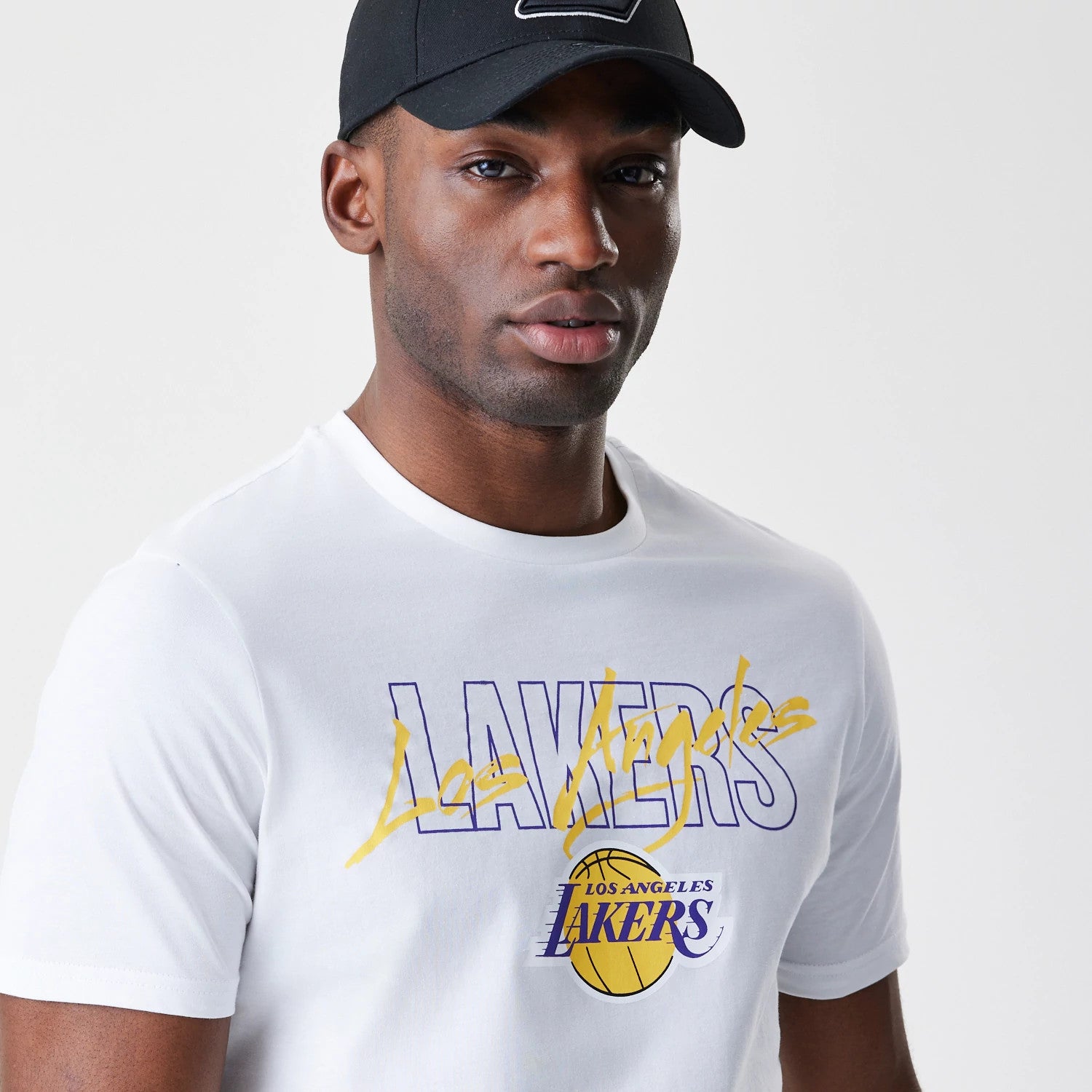 The Male model is wearing LA Lakers NBA Script White T-Shirt 4