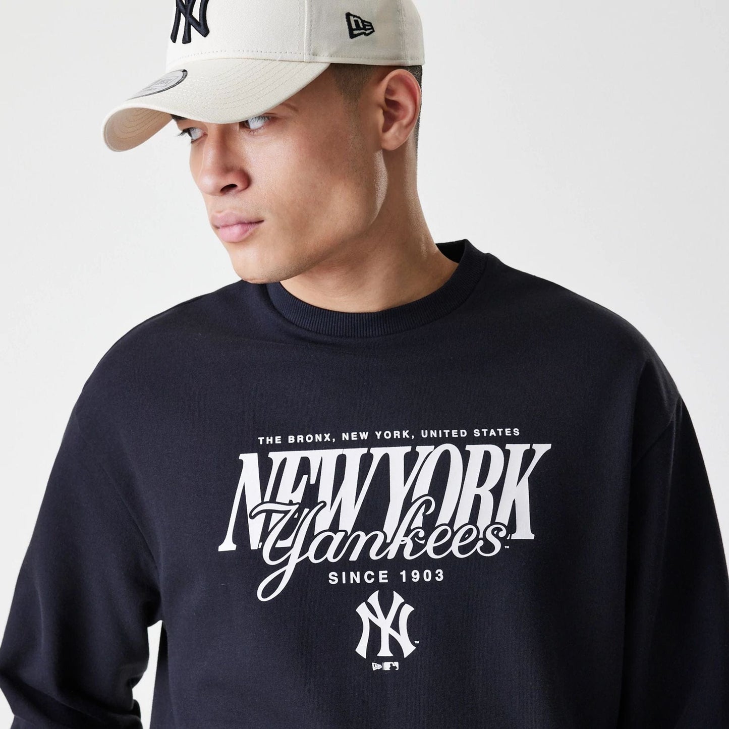 The Male model is wearing New York Yankees MLB Script Black Crew Neck Sweater  4
