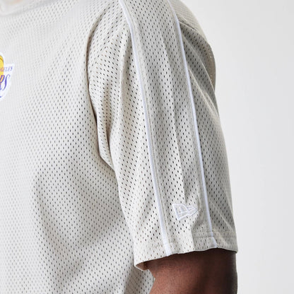 The Male model is wearing LA Lakers NBA Piping Light Beige Oversized Mesh T-Shirt  5