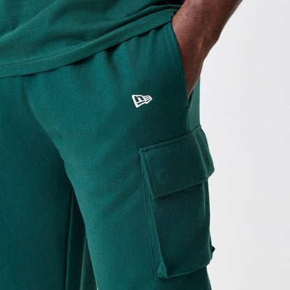 The Male model is wearing  New Era Core Cargo Dark Green Joggers  7