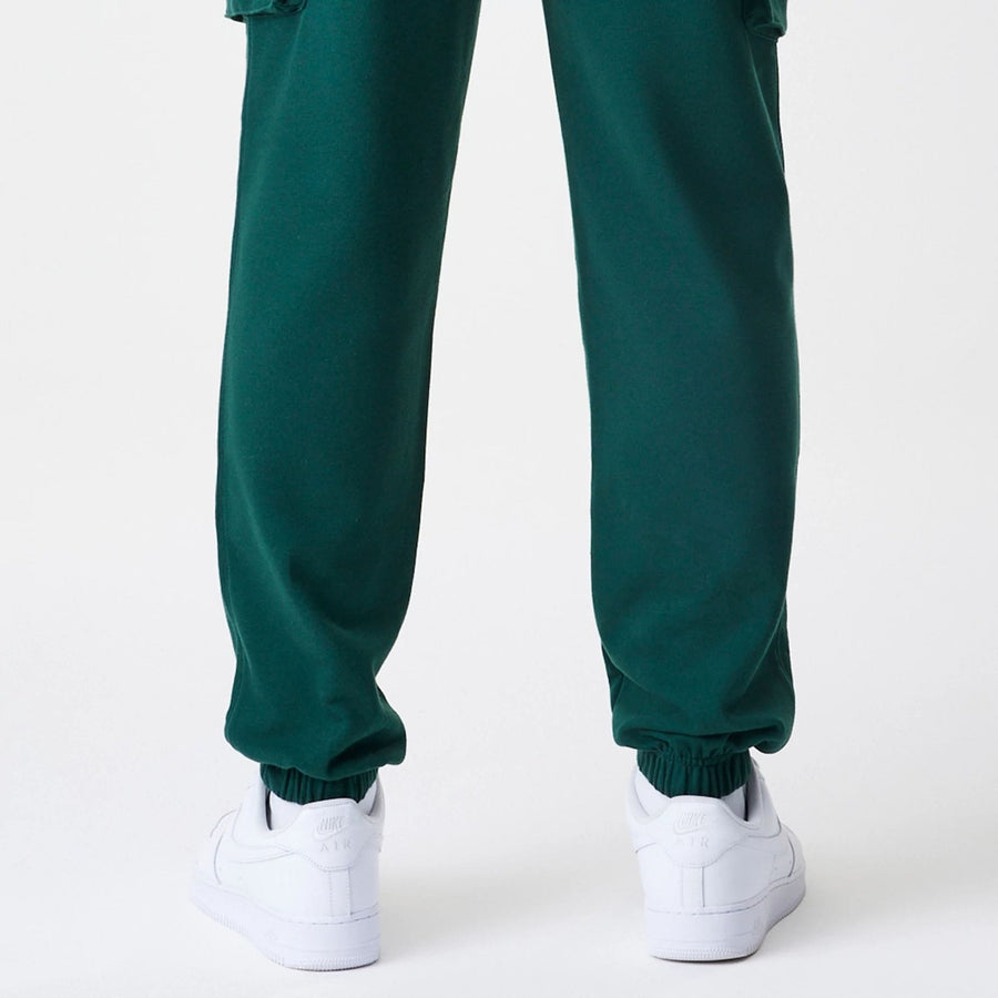 The Male model is wearing  New Era Core Cargo Dark Green Joggers  6