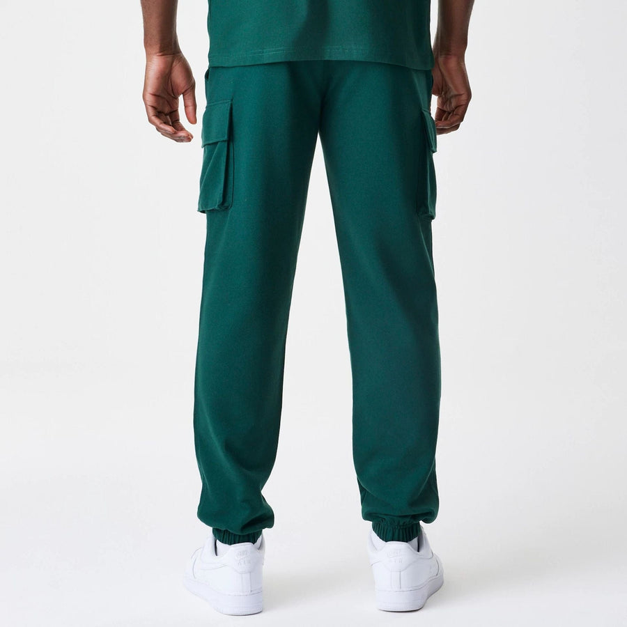 The Male model is wearing  New Era Core Cargo Dark Green Joggers  2
