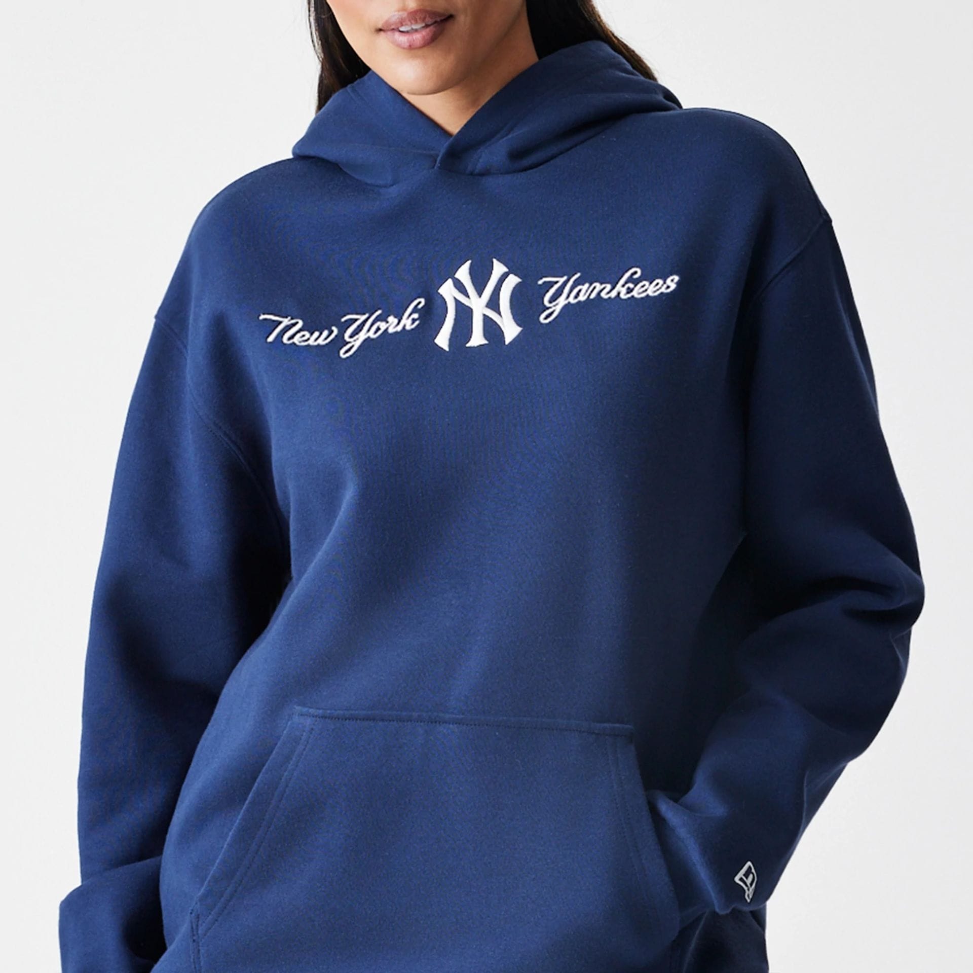 The Male model is wearing New York Yankees MLB Script Navy Oversized Pullover Hoodie  5