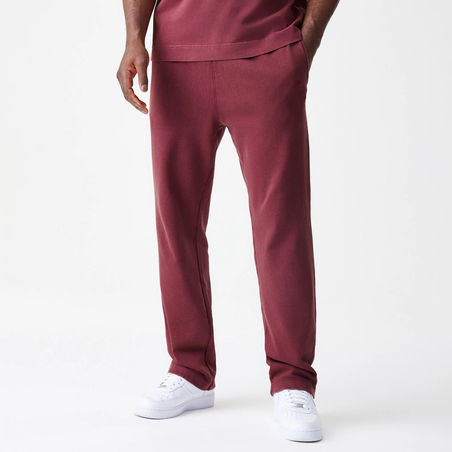The Male model is wearing  New Era Washed Dark Red Straight Leg Joggers 1