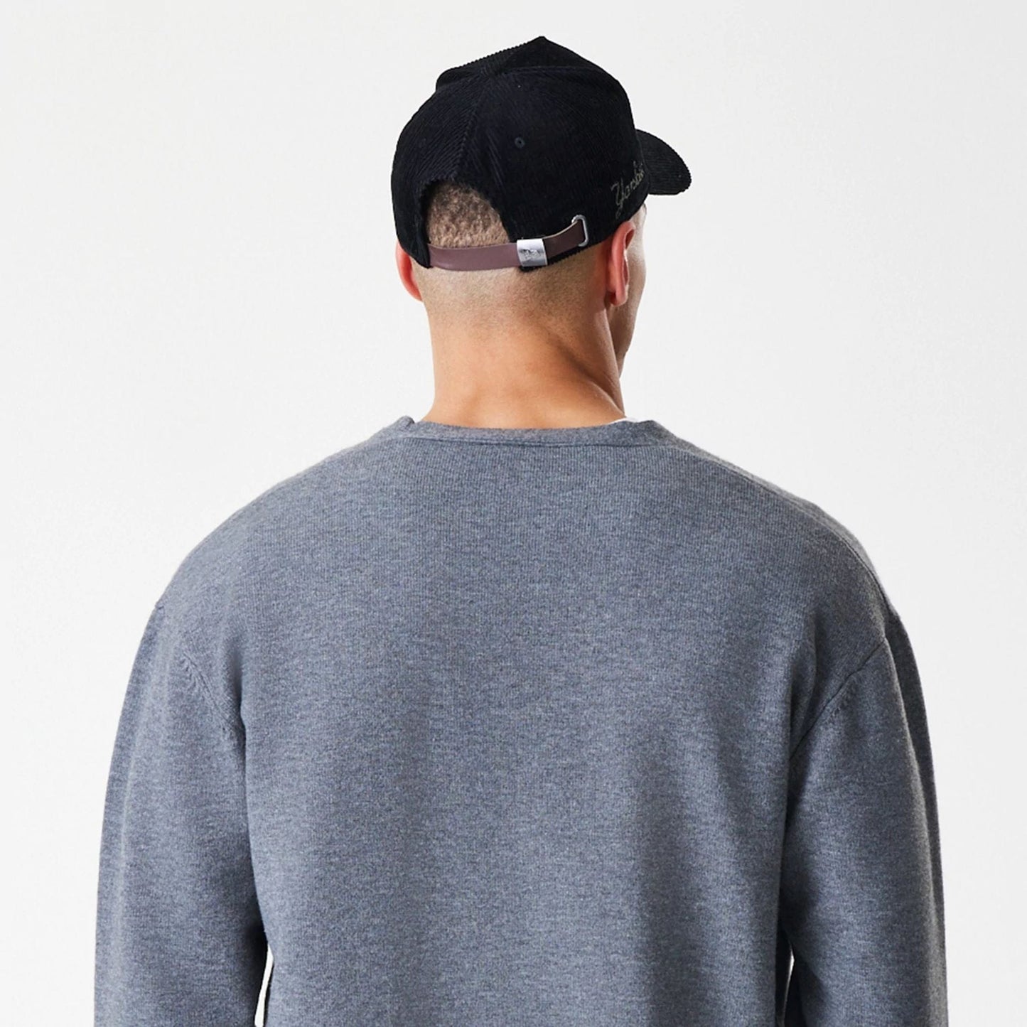 The Male model is wearing  New Era Dark Grey Cardigan  7