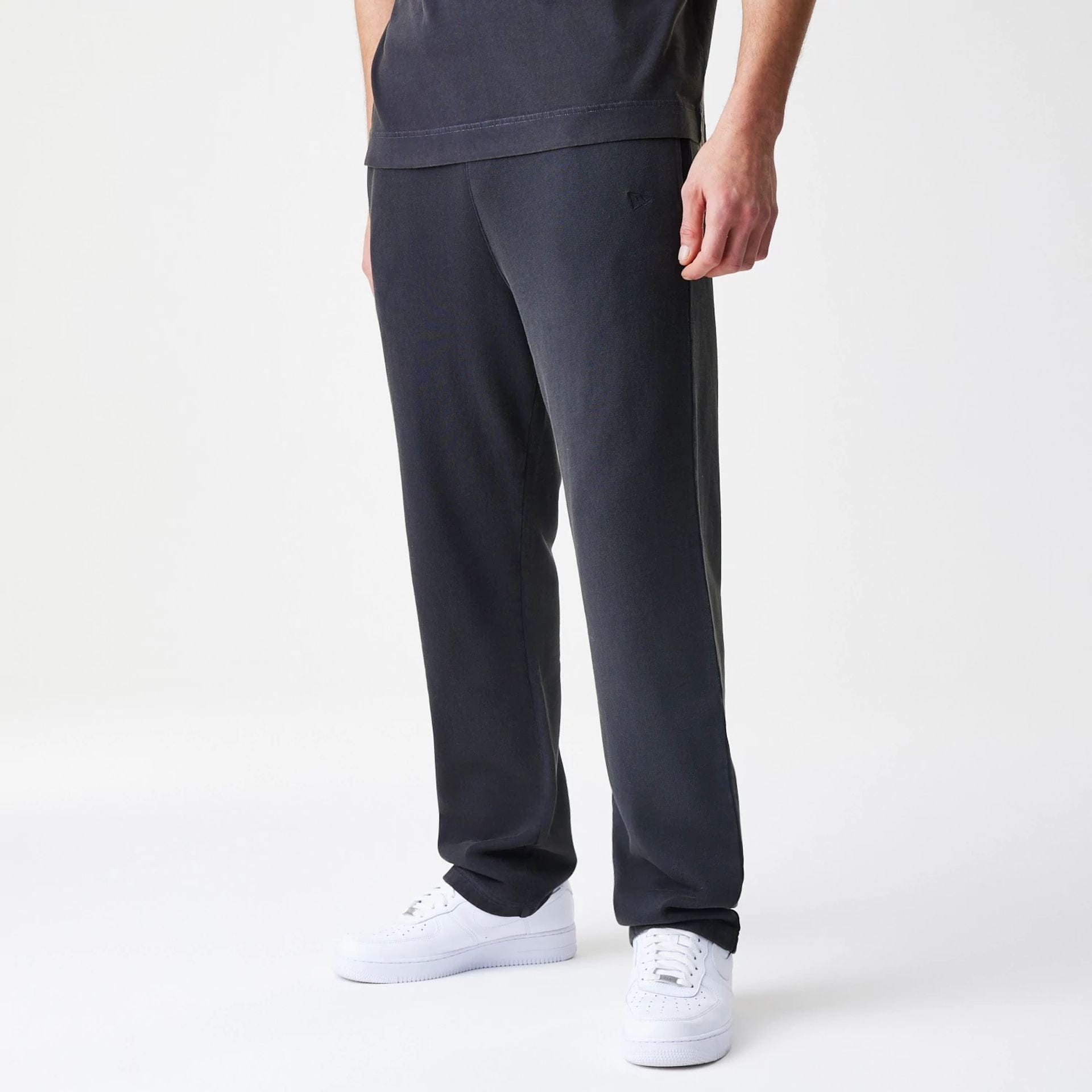 The Male model is wearing  New Era Washed Black Straight Leg Joggers  1