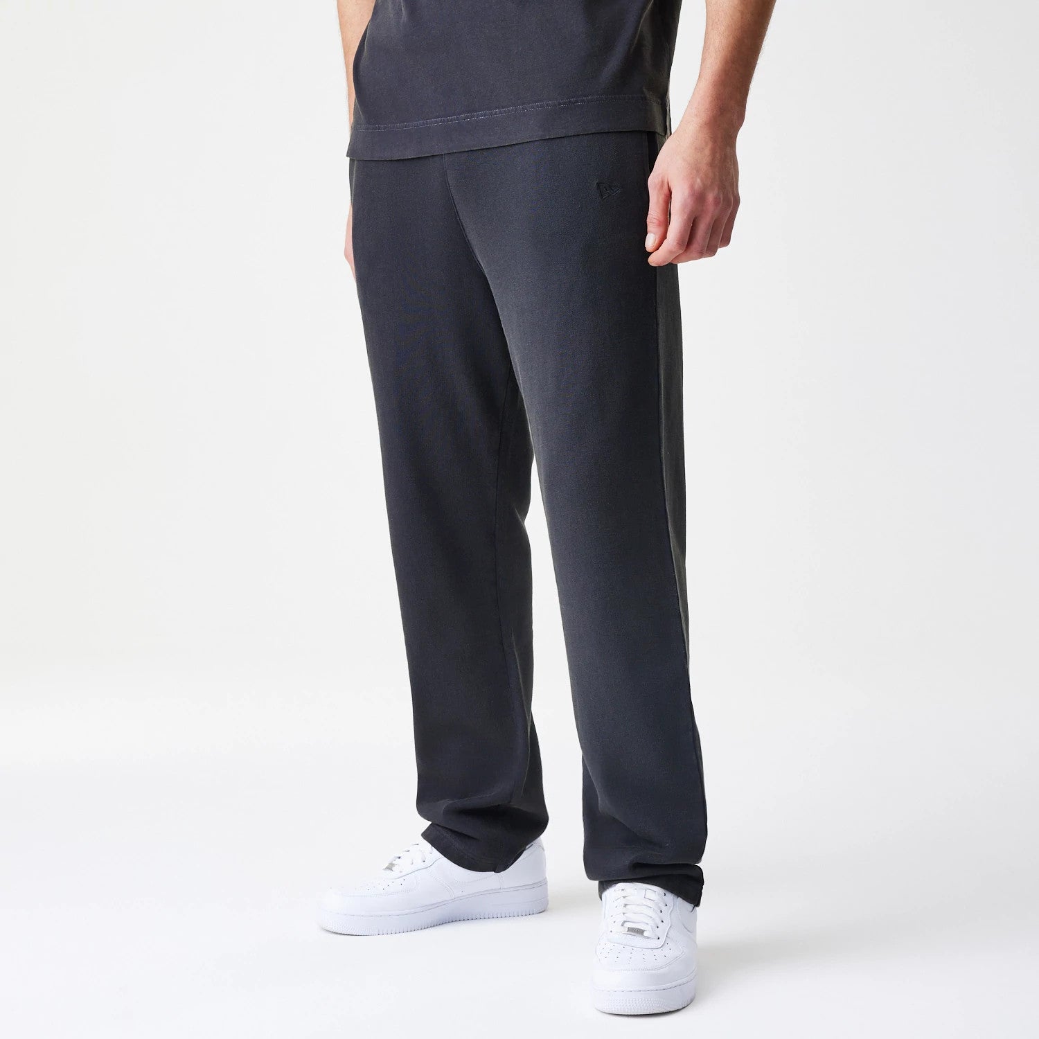 The Male model is wearing  New Era Washed Black Straight Leg Joggers 1