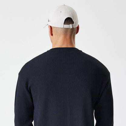 The Male model is wearing  New Era Waffle Black Long Sleeve T-Shirt  7