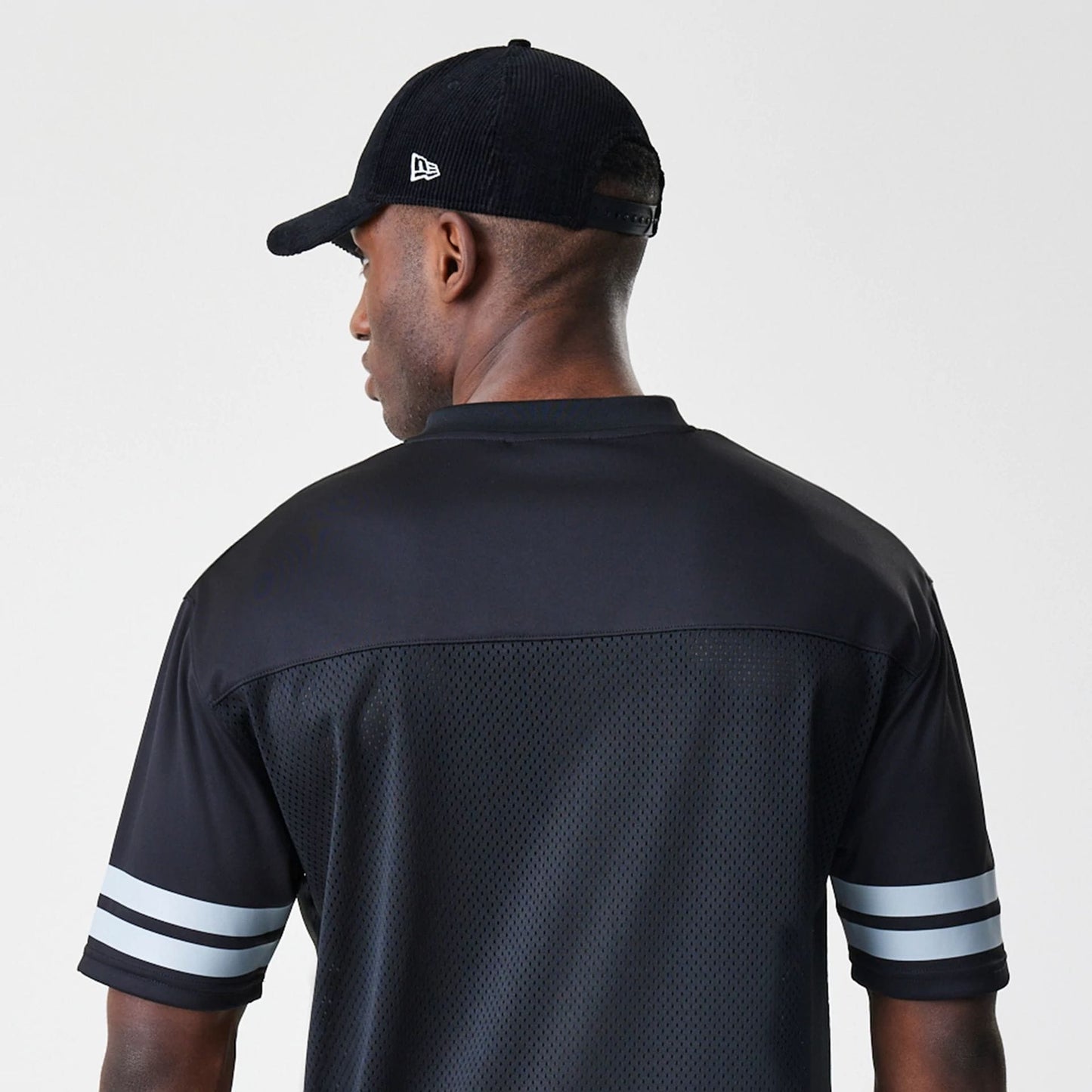 The Male model is wearing Las Vegas Raiders NFL Mesh Black Jersey 6