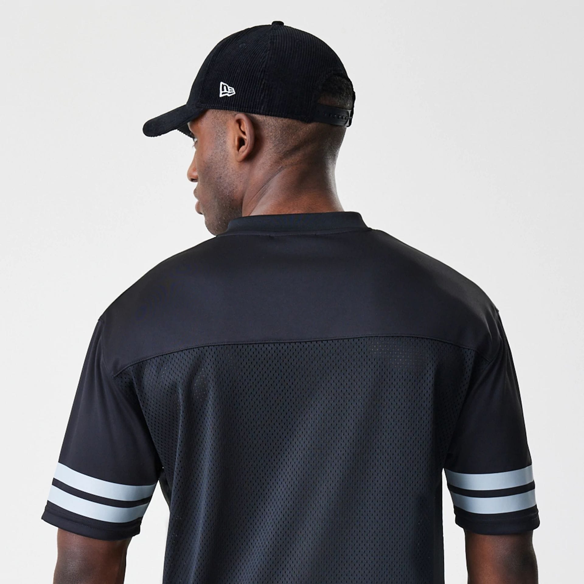 The Male model is wearing Las Vegas Raiders NFL Mesh Black Jersey 6