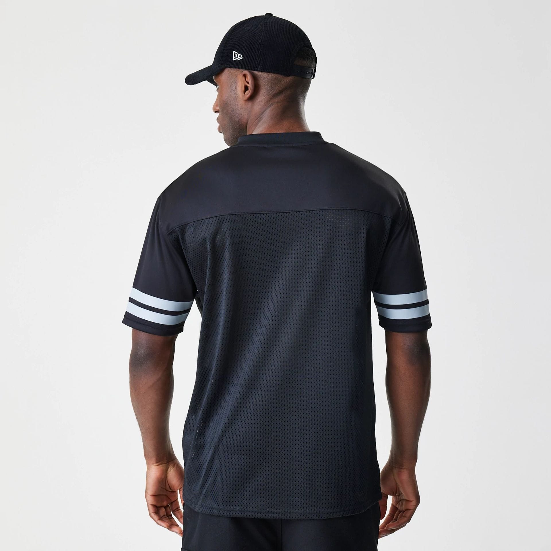 The Male model is wearing Las Vegas Raiders NFL Mesh Black Jersey 2