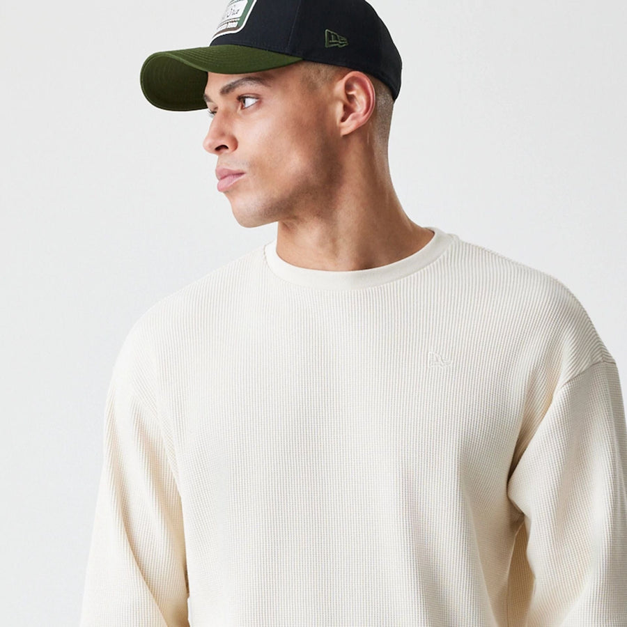 The Male model is wearing  New Era Waffle Light Beige Long Sleeve T-Shirt  4