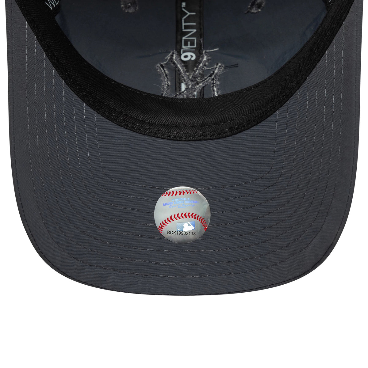 New York Yankees MLB Tonal Recycled Dark Grey New Era 9TWENTY Adjustable Cap, inside view showing black taping with Yankees print, a dark grey undervisor and a central sticker with a baseball graphic.