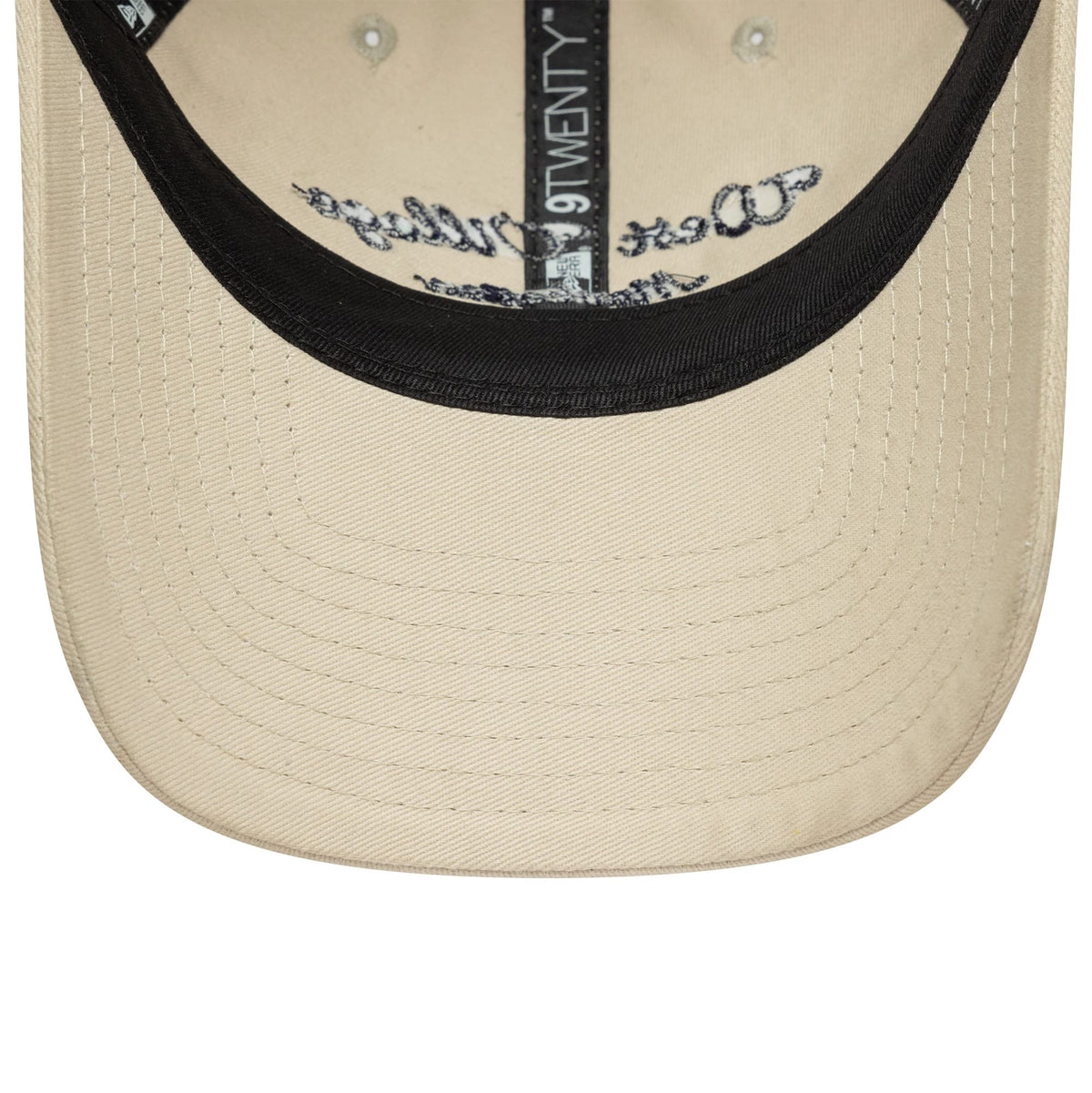 This is a  New Era Wordmark Cream 9TWENTY Adjustable Cap 5