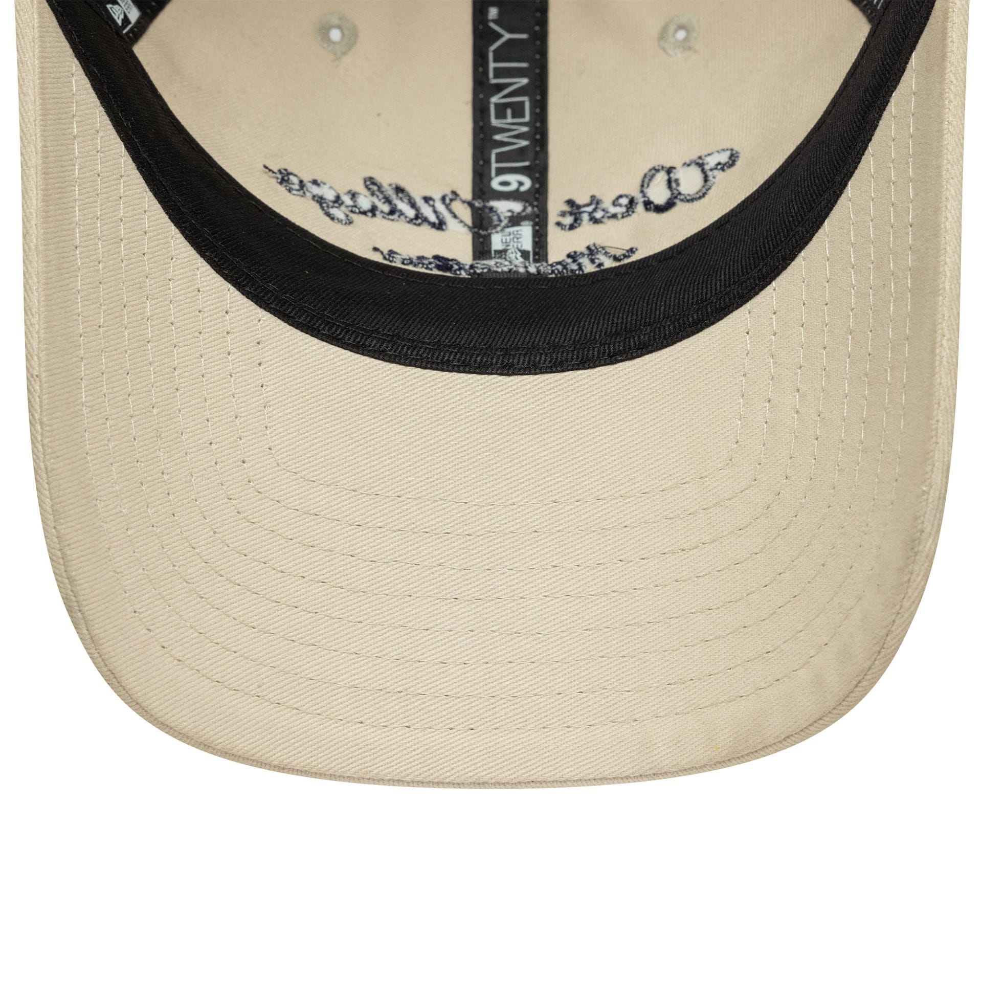 This is a  New Era Wordmark Cream 9TWENTY Adjustable Cap 5