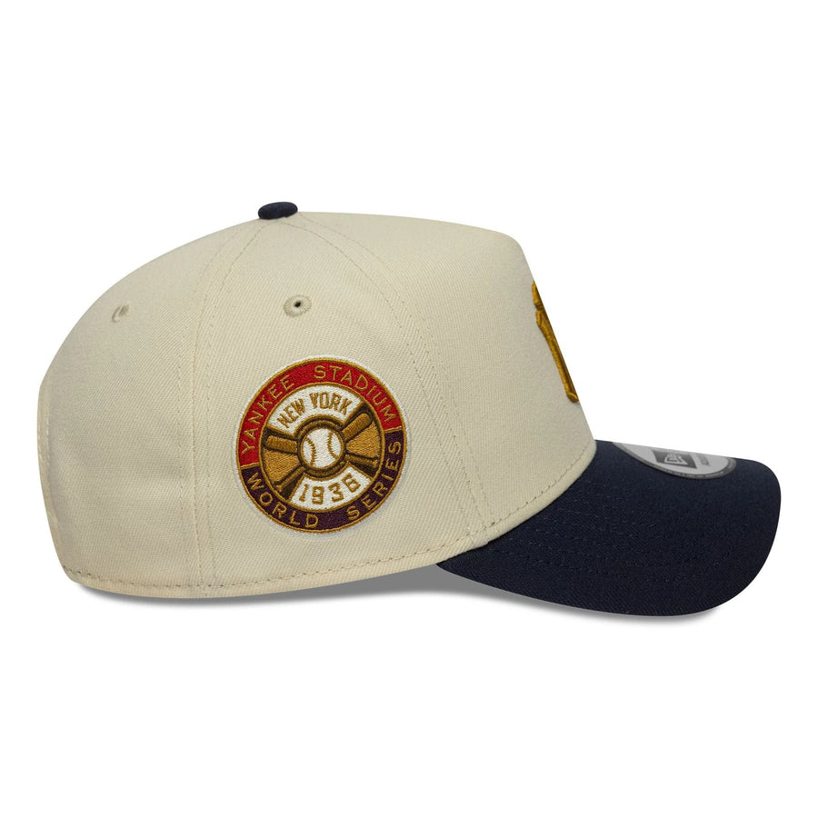This is a New York Yankees MLB World Series Patch Cream 9FORTY E-Frame Adjustable Cap 5
