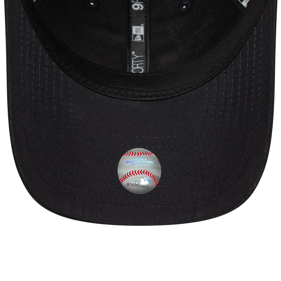 This is a New York Yankees MLB Pin Navy 9FORTY Adjustable Cap 5