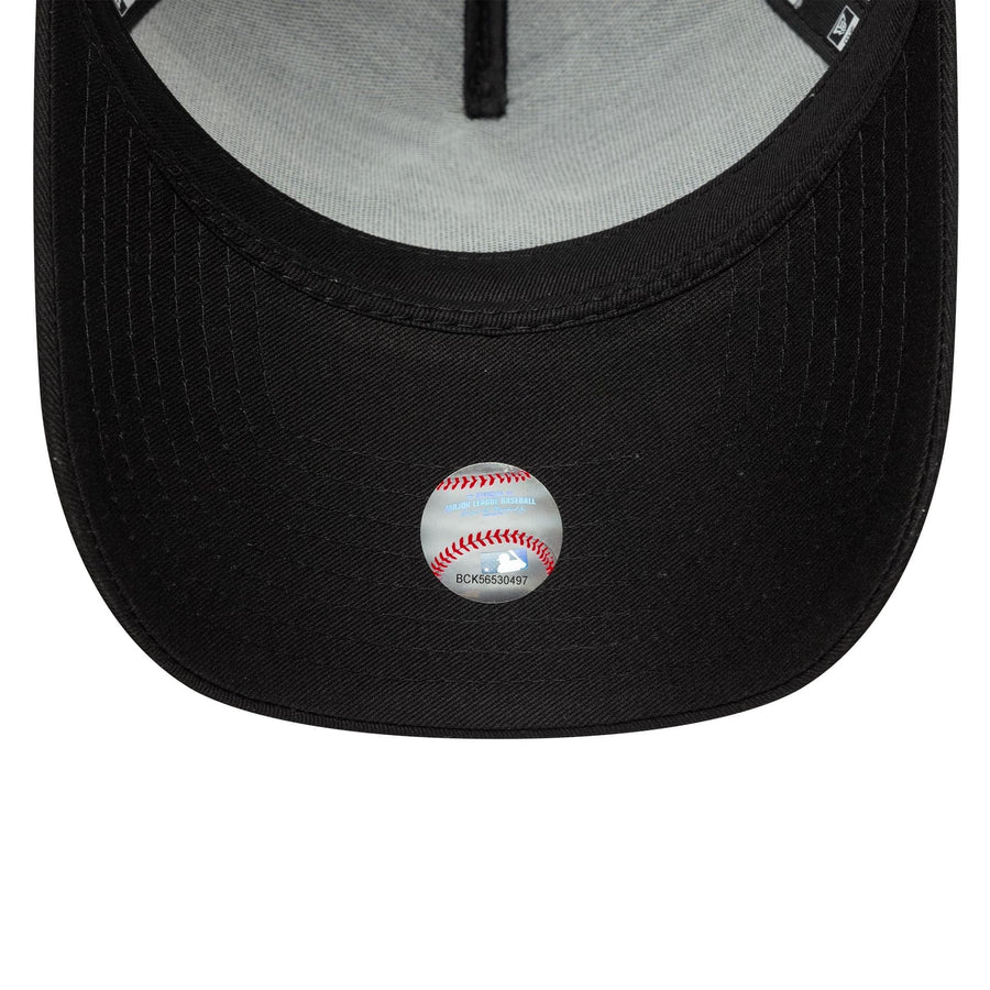 This is a New York Yankees MLB League Essential Black 9FORTY A-Frame Trucker Adjustable Cap 5