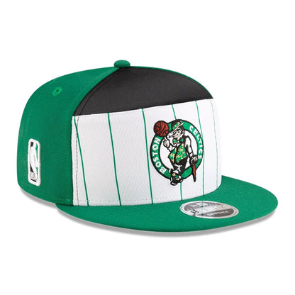 This is a Boston Celtics NBA Tip Off 2025 Green 9FIFTY Split Panel Snapback Adjustable Cap 1