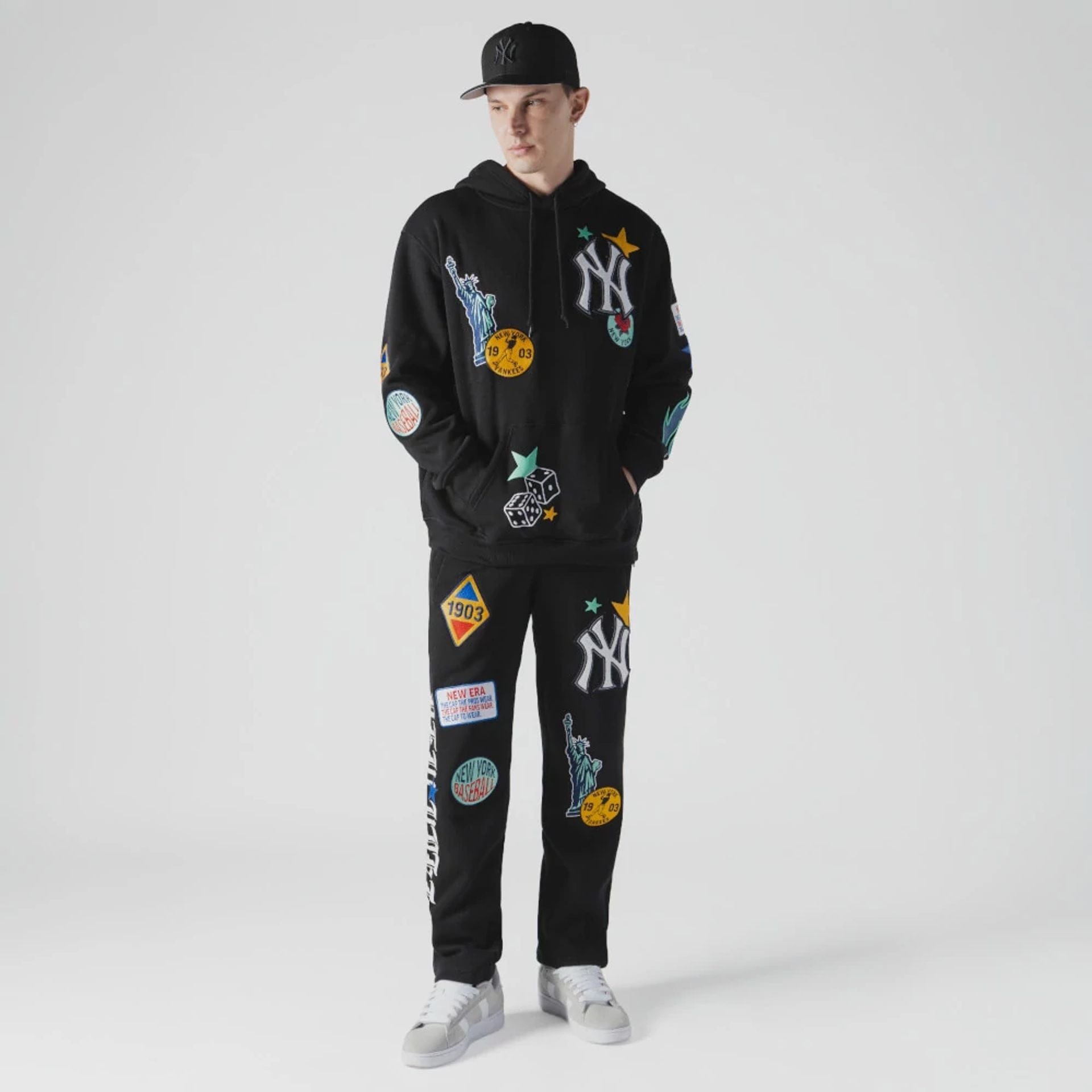 The Male model is wearing New York Yankees MLB x Uptown Threads Black Joggers  4