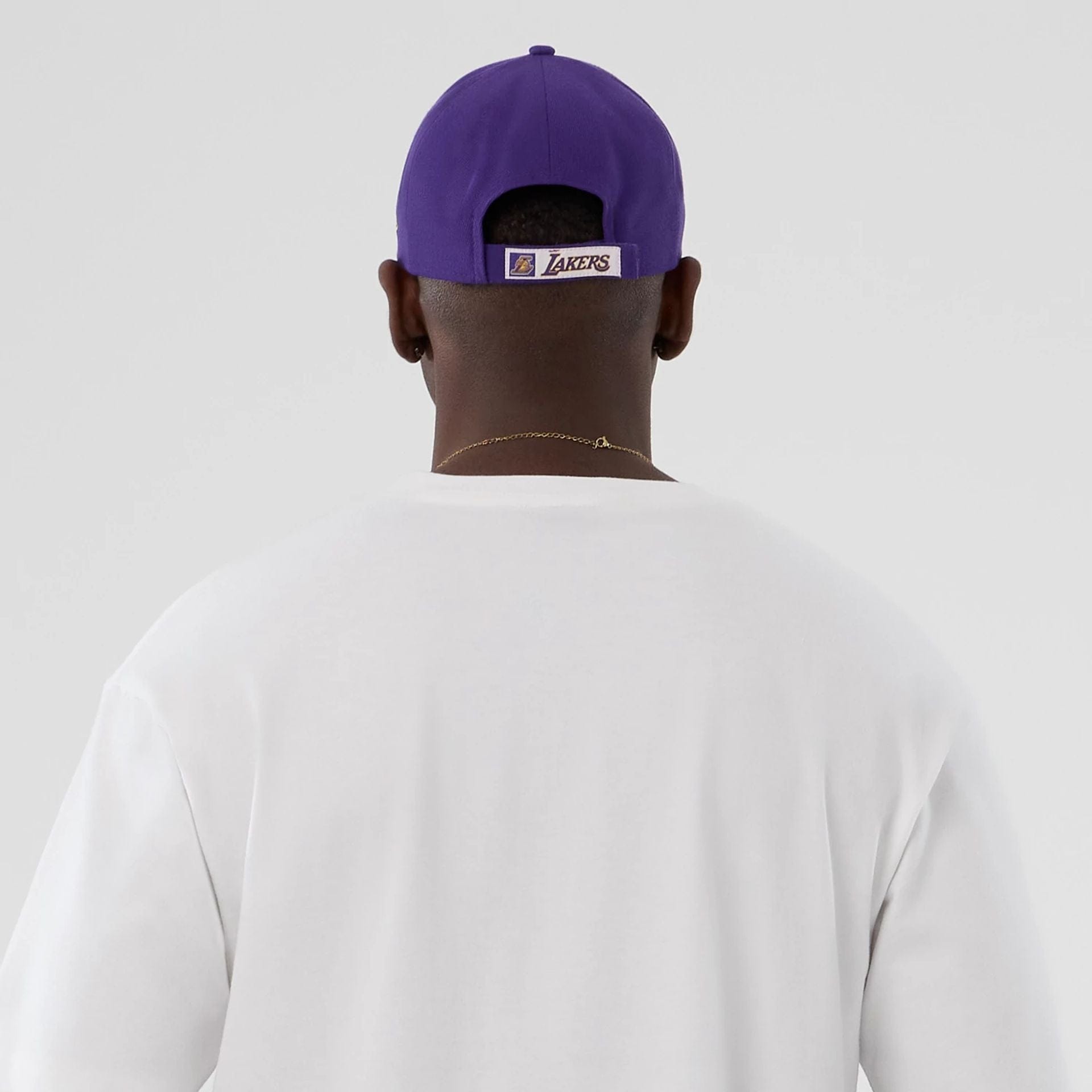 The Male model is wearing LA Lakers NBA Lifestyle Graphic White T-Shirt  6