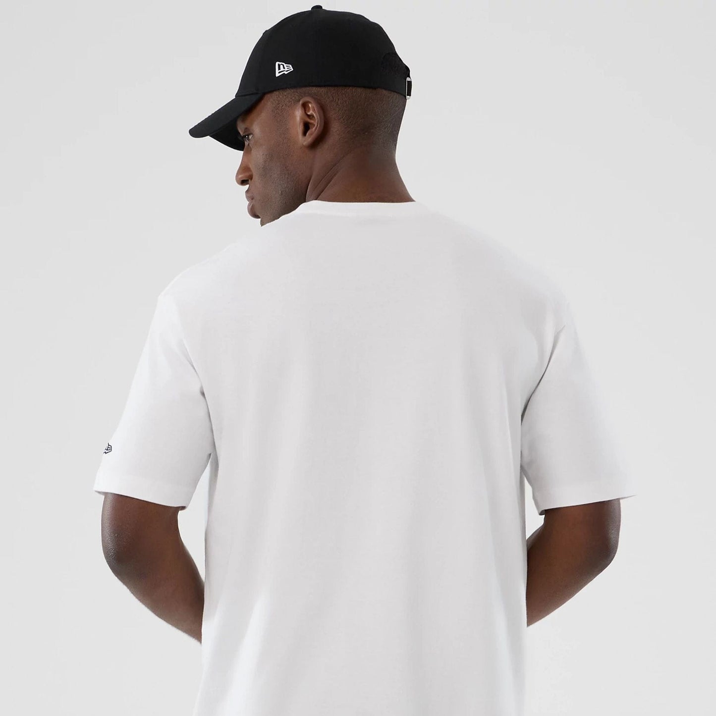 The Male model is wearing New York Yankees MLB Lifestyle Graphic White T-Shirt  6