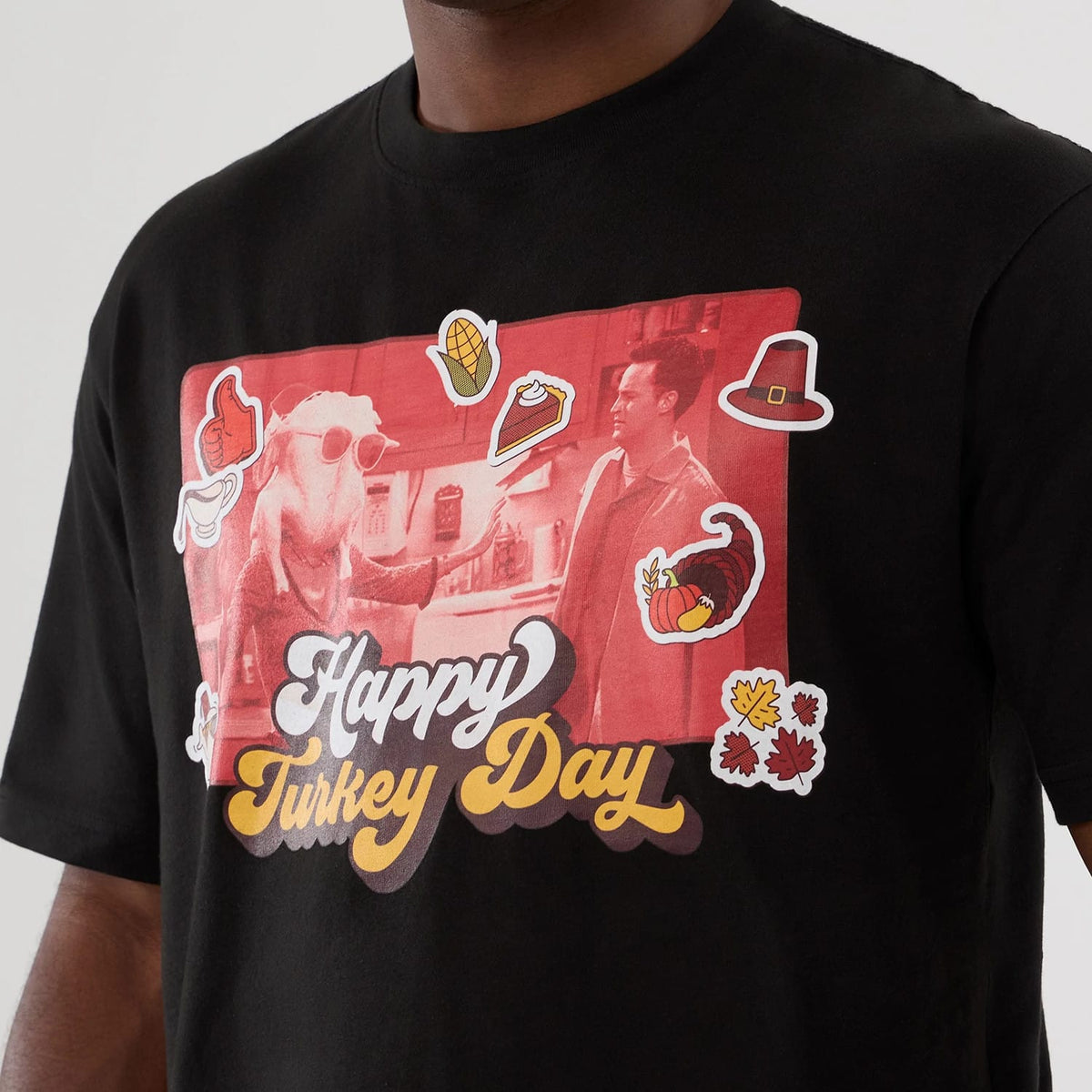 The Male model is wearing Friends Turkey Head Lifestyle Graphic Black T-Shirt 4