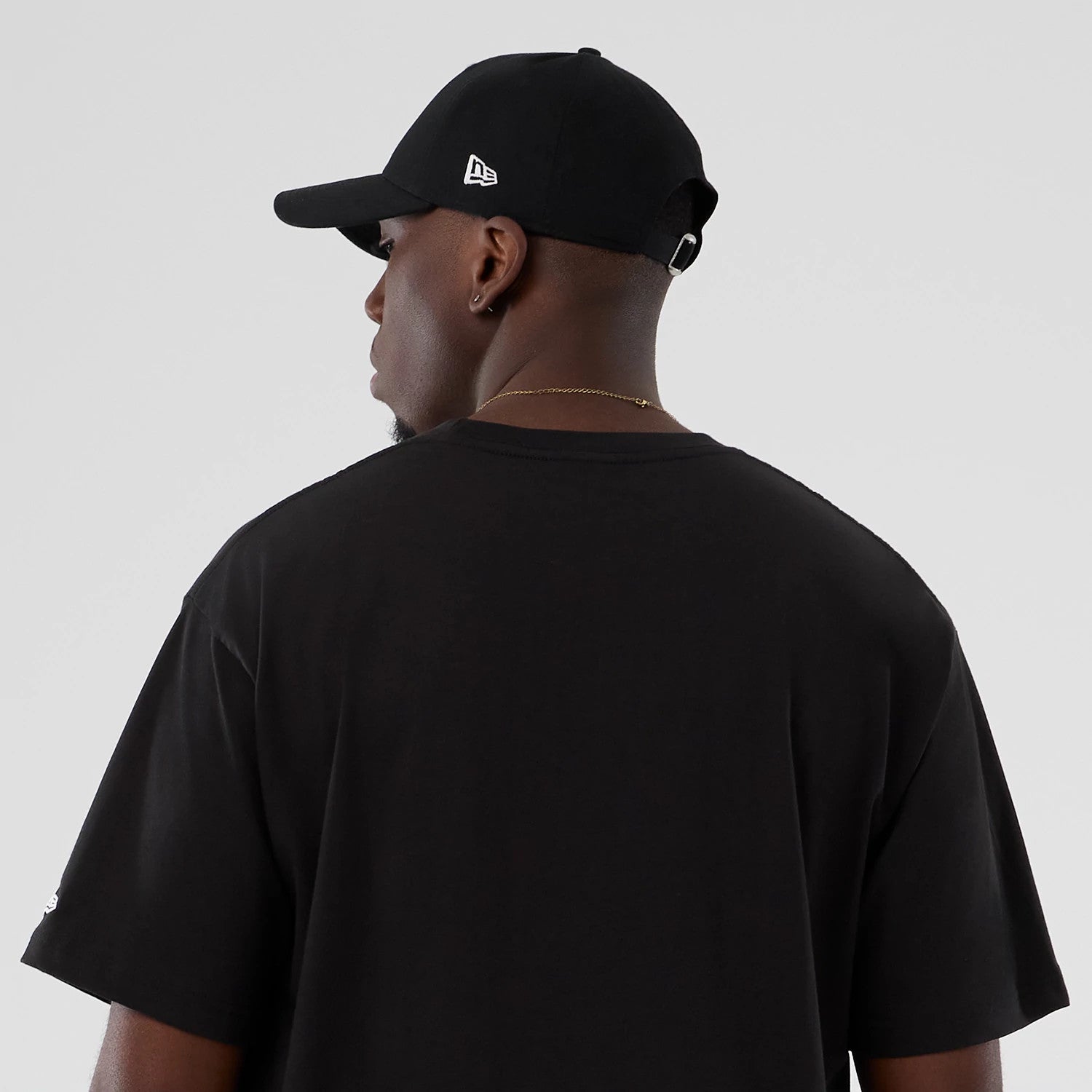 The Male model is wearing Seinfeld Lifestyle Graphic Black T-Shirt 6