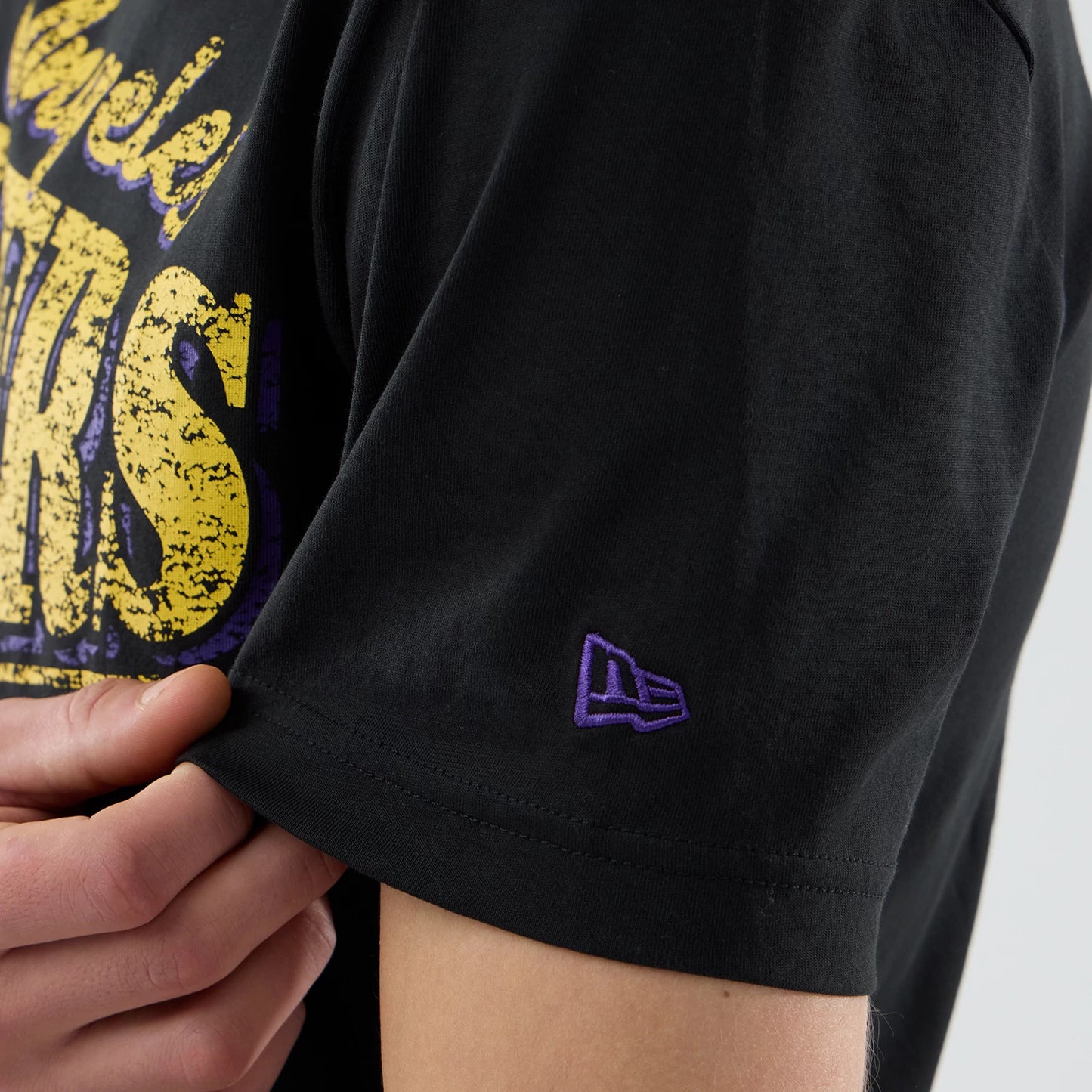 The Male model is wearing LA Lakers NBA City Edition Black T-Shirt 3