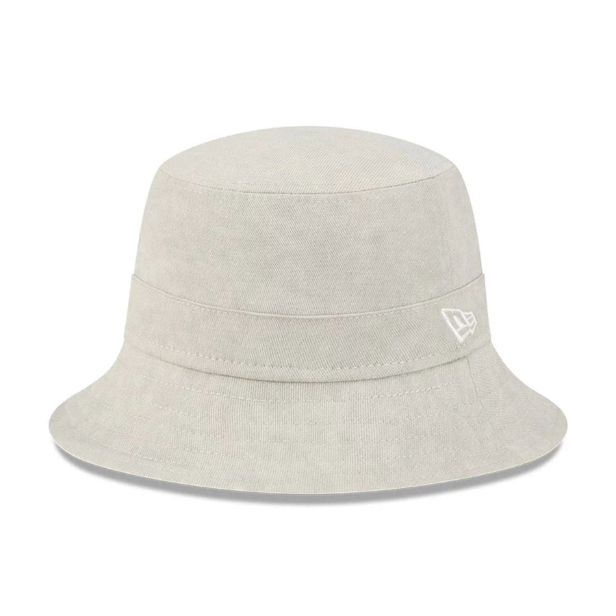 This is a New Era Light Cream Bucket Hat 1
