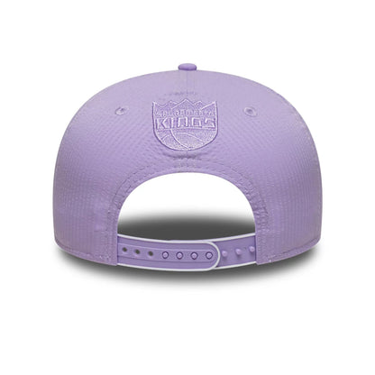 This is a Sacramento Kings Pastel Crepe Purple 9SEVENTY Stretch Snap Adjustable Cap 5