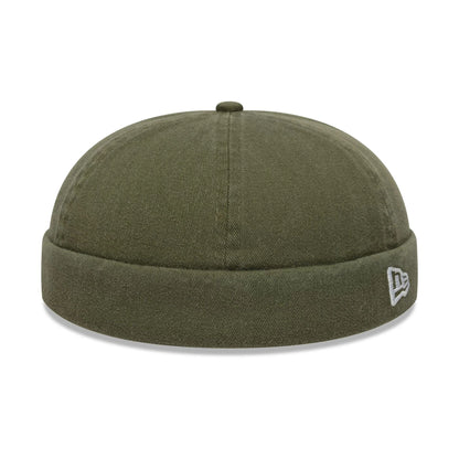 This is a New Era Washed Cotton Green Docker Adjustable Hat 1