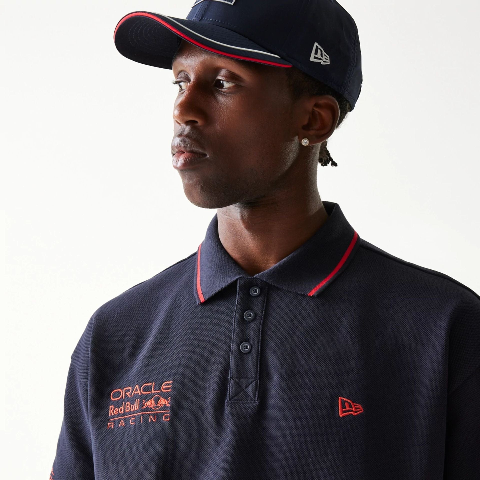 The Male model is wearing Red Bull Racing Dark Blue Polo T-Shirt 4