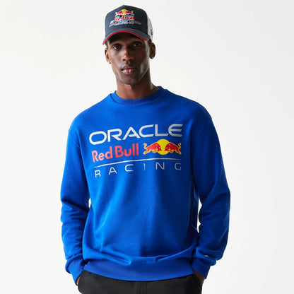 The Male model is wearing Red Bull Racing Blue Oversized Crew Neck Sweater 1