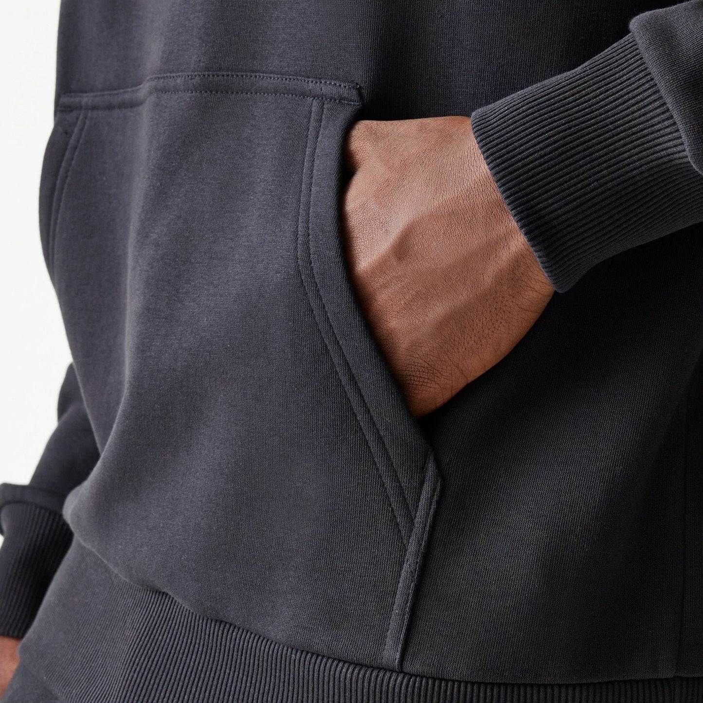 The Male model is wearing Red Bull Racing Black Oversized Pullover Hoodie 5