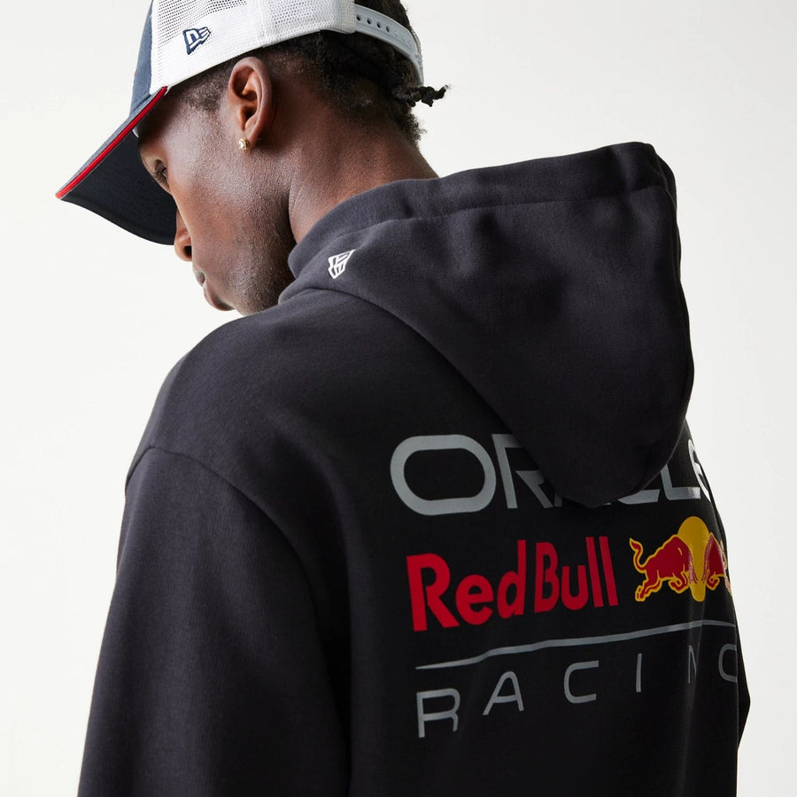 The Male model is wearing Red Bull Racing Black Oversized Pullover Hoodie 6