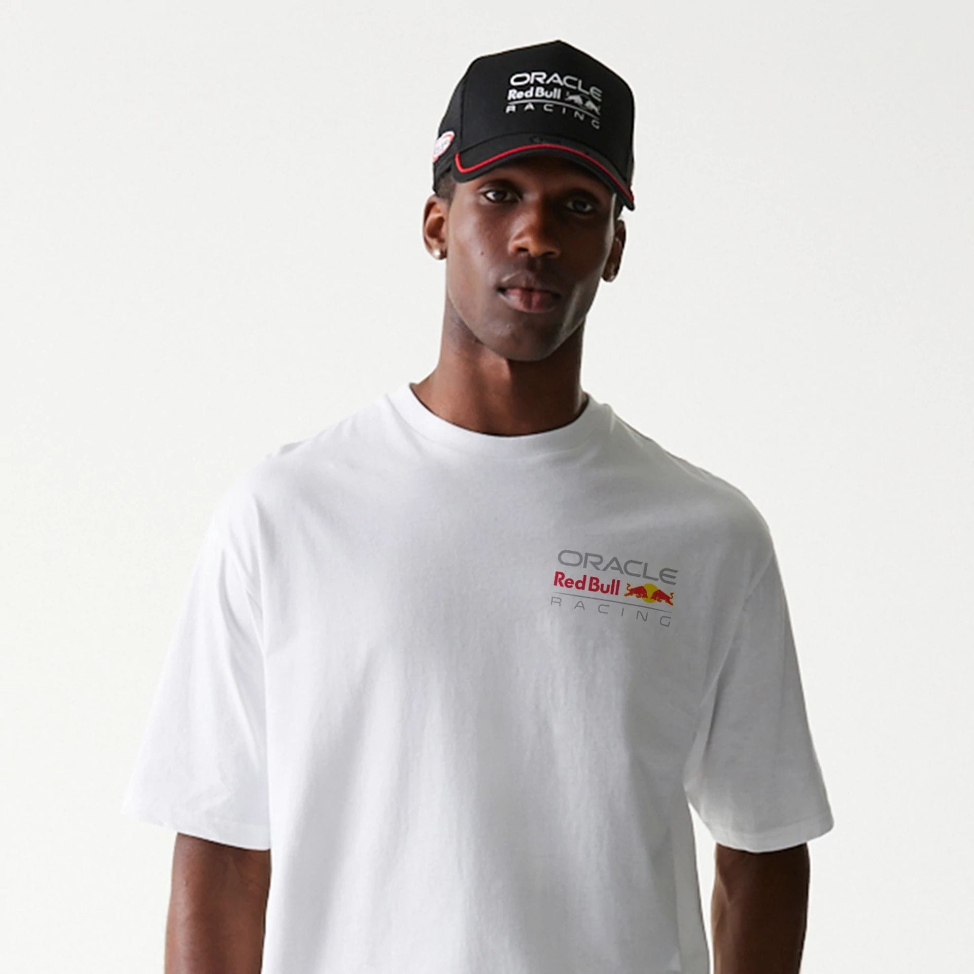 The Male model is wearing Red Bull Racing White Oversized T-Shirt 3